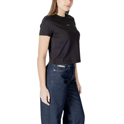 Woman wearing Calvin Klein Jeans Black Recycled Cotton Sportswear t-shirt for a casual look.