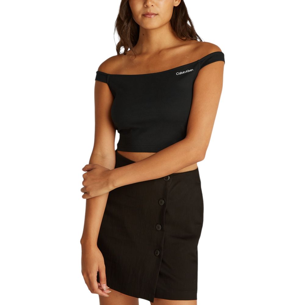 Woman wearing Calvin Klein Jeans Black Viscose Top with bardot design, paired with a black buttoned skirt.