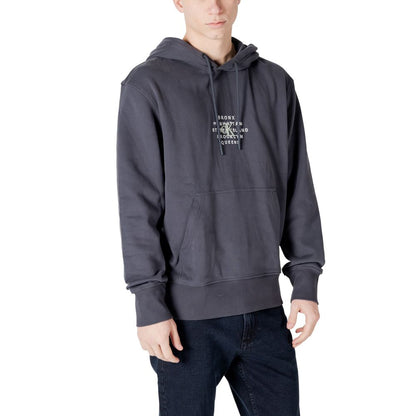Man wearing Calvin Klein Jeans Gray Cotton Hoody with NYC stamp graphic design for casual style.