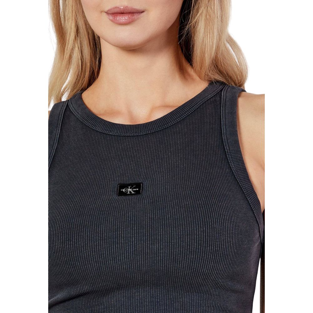Woman wearing Calvin Klein Jeans Gray Recycled Cotton Tank Tops with a fitted design and black label detail.