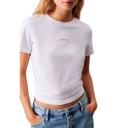 Woman wearing Calvin Klein Jeans White Recycled Cotton Sportswear t-shirt with minimalist design and logo.