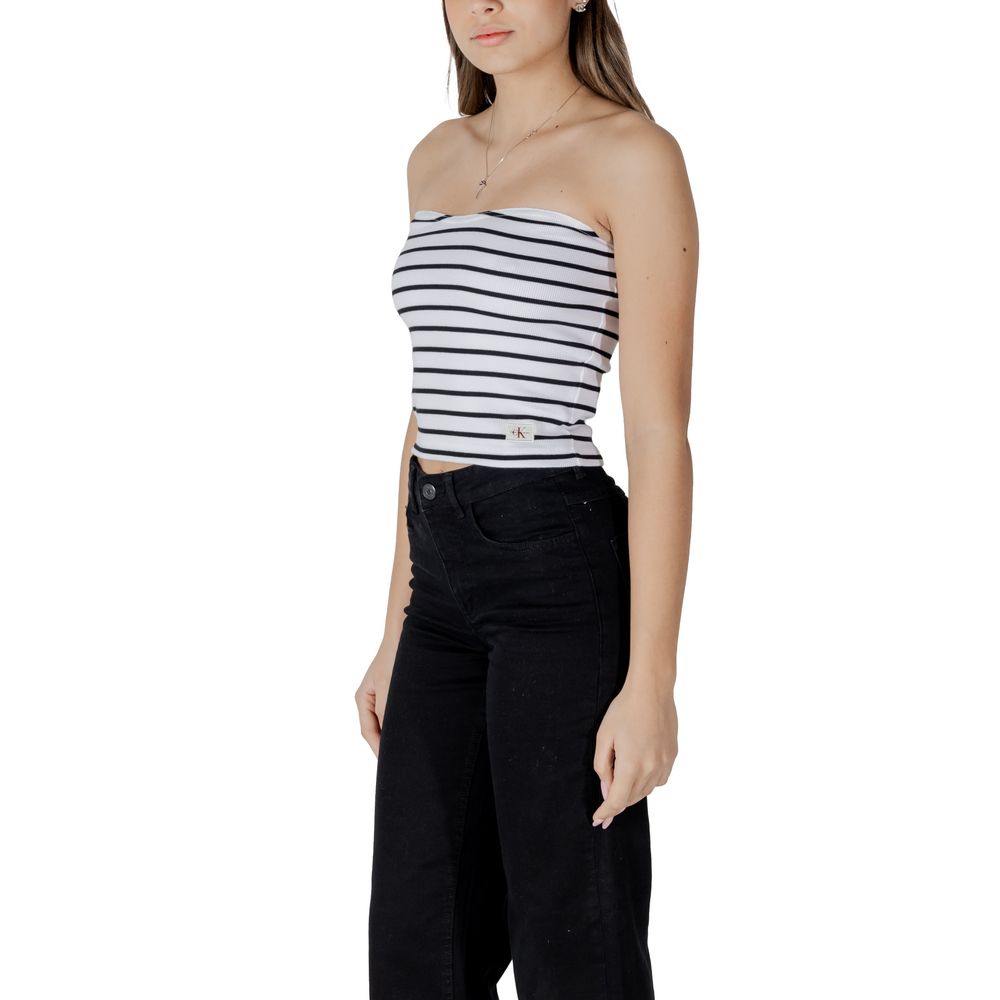Woman wearing Calvin Klein Jeans White Recycled Cotton Top with stripes, showcasing ribbed design for elegance and versatility.