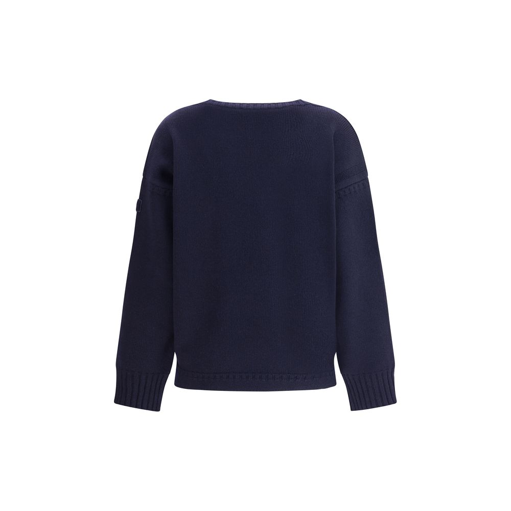 Back view of Chloé Blue Wool Sweatshirt showcasing ribbed edges and oversized design.