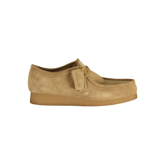 Clarks Beige Suede Men Sneaker in side view showcasing suede texture and lace-up design