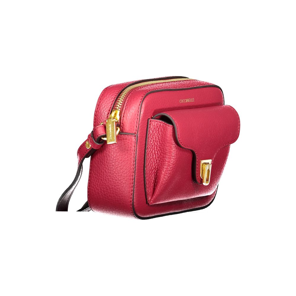Coccinelle Red Leather Women Handbag with adjustable strap and rotary closure, showing side view with external pocket.