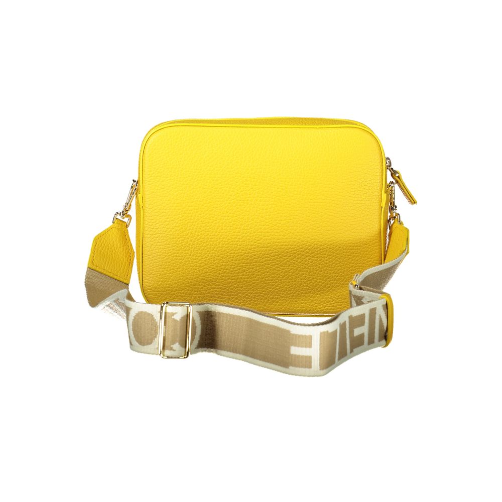 Coccinelle Yellow Leather Women Handbag with adjustable strap, vibrant design, and secure zip closure for fashion-forward individuals.