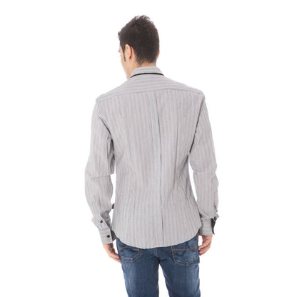 Man wearing Costume National White Cotton Men Shirt, showcasing back view with polished collar and refined cuffs.