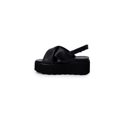 Cult Black Leather Platform Sandals with crossed straps and platform sole for contemporary style and comfort