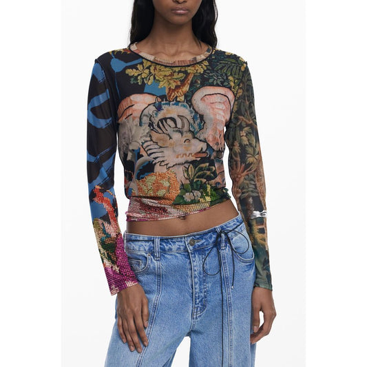 Model wearing Desigual Black Polyester Women T-Shirt with vibrant print and blue jeans.