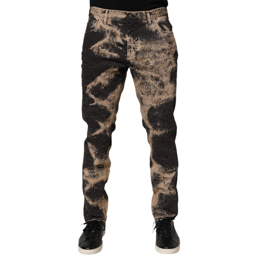 Dolce & Gabbana Beige Black Corduroy Tie-Dye Cotton Blend Pants modeled with shoes, showcasing modern streetwear style.