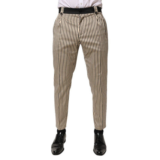 Dolce & Gabbana Beige Black Striped Cotton Slim Fit Trousers Pants on model, featuring tapered design and elegant vertical stripes.