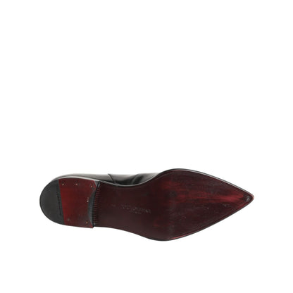 Sole view of Dolce & Gabbana Black Calfskin Leather Men SHORT Boots Shoes showcasing the high-quality craftsmanship.