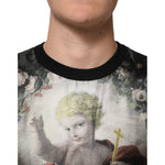 Dolce & Gabbana Black Cashmere Cherub Print Baroque Sweater with Baroque-inspired design on a model's chest, close-up view.