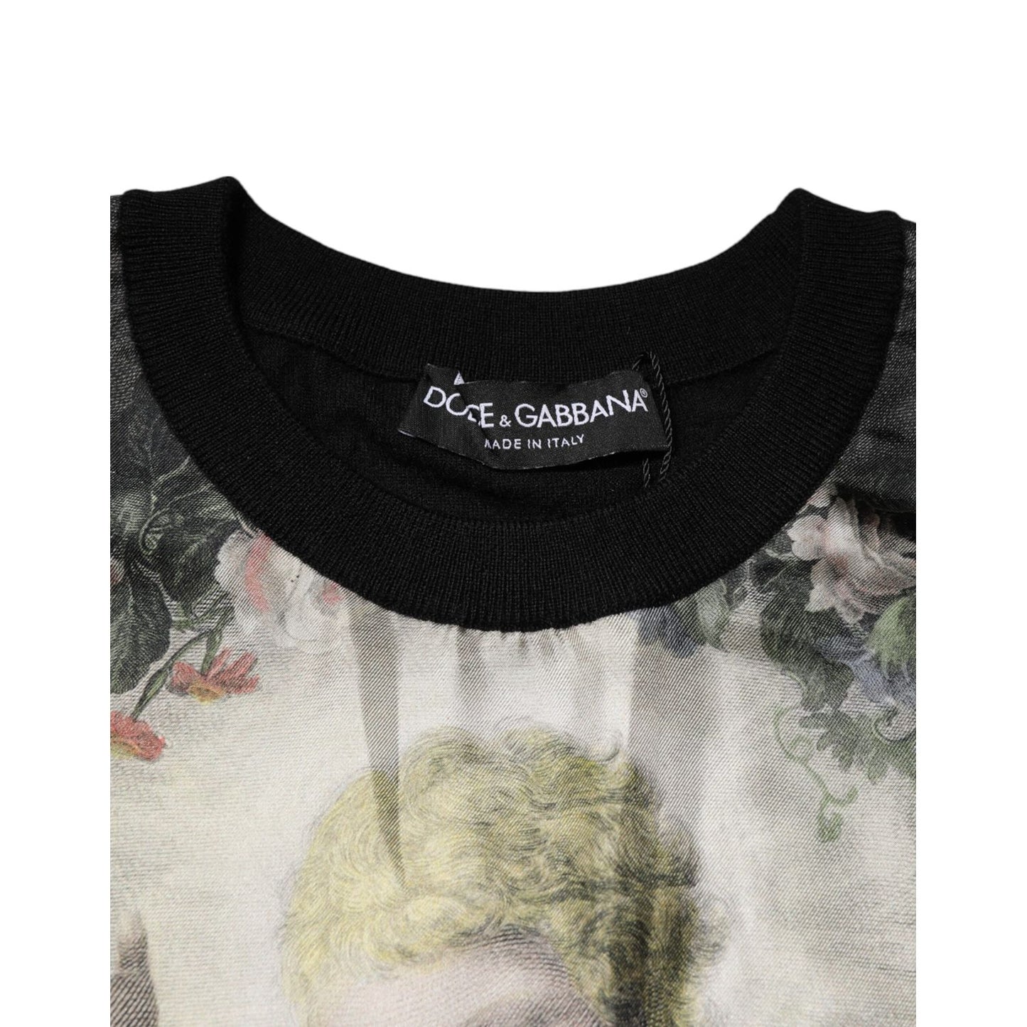 Dolce & Gabbana Black Cashmere Cherub Print Baroque Sweater featuring a floral Baroque design, made in Italy, close-up of neckline.