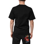 Back view of Dolce & Gabbana Black Cotton DG Logo Graffiti Short Sleeve T-shirt on model with floral embroidery on jeans.