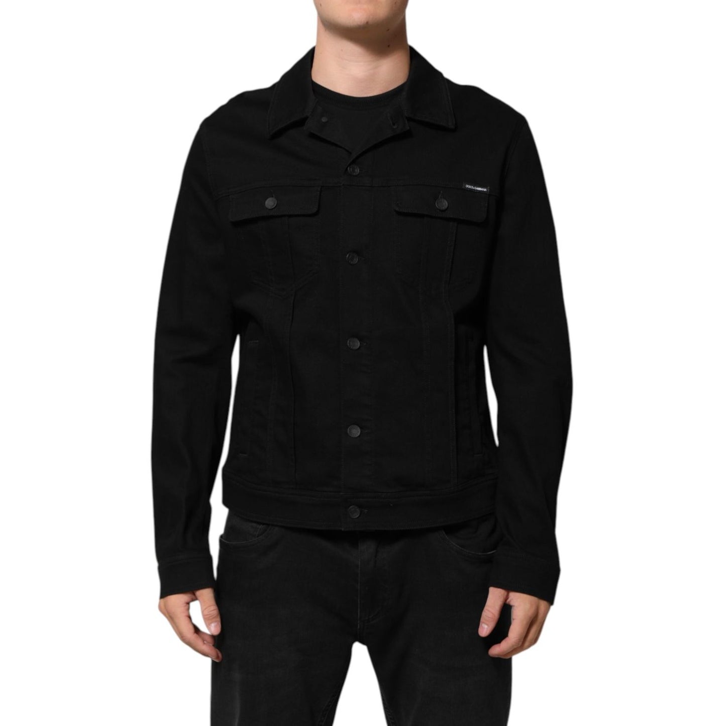 Dolce & Gabbana Black Cotton Denim Stretch Giubbotto Jacket with button closure and chest pockets, modeled front view.
