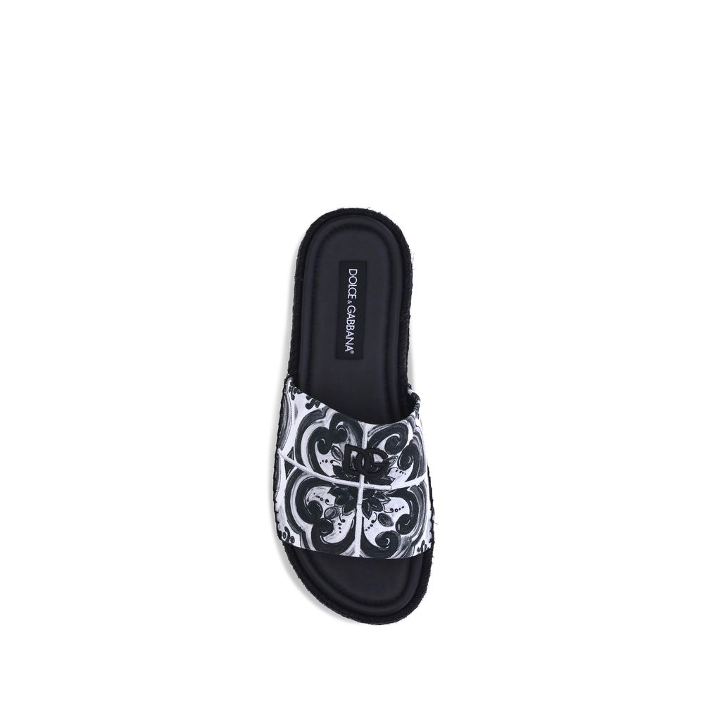 Dolce & Gabbana Black Cotton Espadrilles with shell print, round toe, high band, rope sole, and logoed insole for summer style.