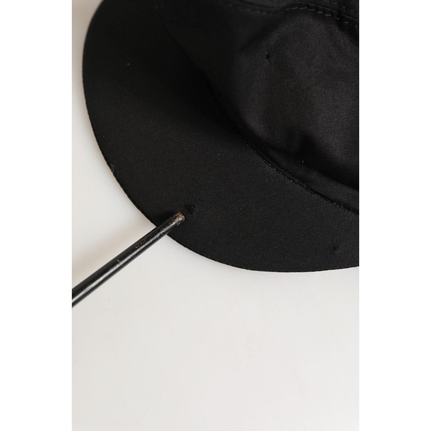 Dolce & Gabbana Black Cotton Stretch Newsboy Cloth Capello Hat brim detail, showing elegant design and craftsmanship.