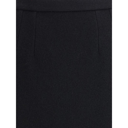 Close-up of Dolce & Gabbana Black Fleece Wool Long Skirt showcasing its elegant tailoring and fine wool texture.