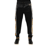 Dolce & Gabbana Black Gold Satin Crown Side Stripe Jogger Pants with ribbed cuffs and elastic waistband.
