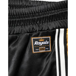 Dolce & Gabbana Black Gold Satin Crown Side Stripe Jogger Pants close-up with DG Millennial label and crown embroidery detail.