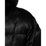 Dolce & Gabbana Black Monogram Logo Puffer Nylon Hooded Jacket detail view showcasing subtle DG monogram design on nylon fabric.