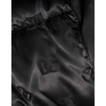 Close-up of Dolce & Gabbana Black Monogram Logo Puffer Nylon Hooded Jacket's DG design, highlighting the detailed monogram pattern.