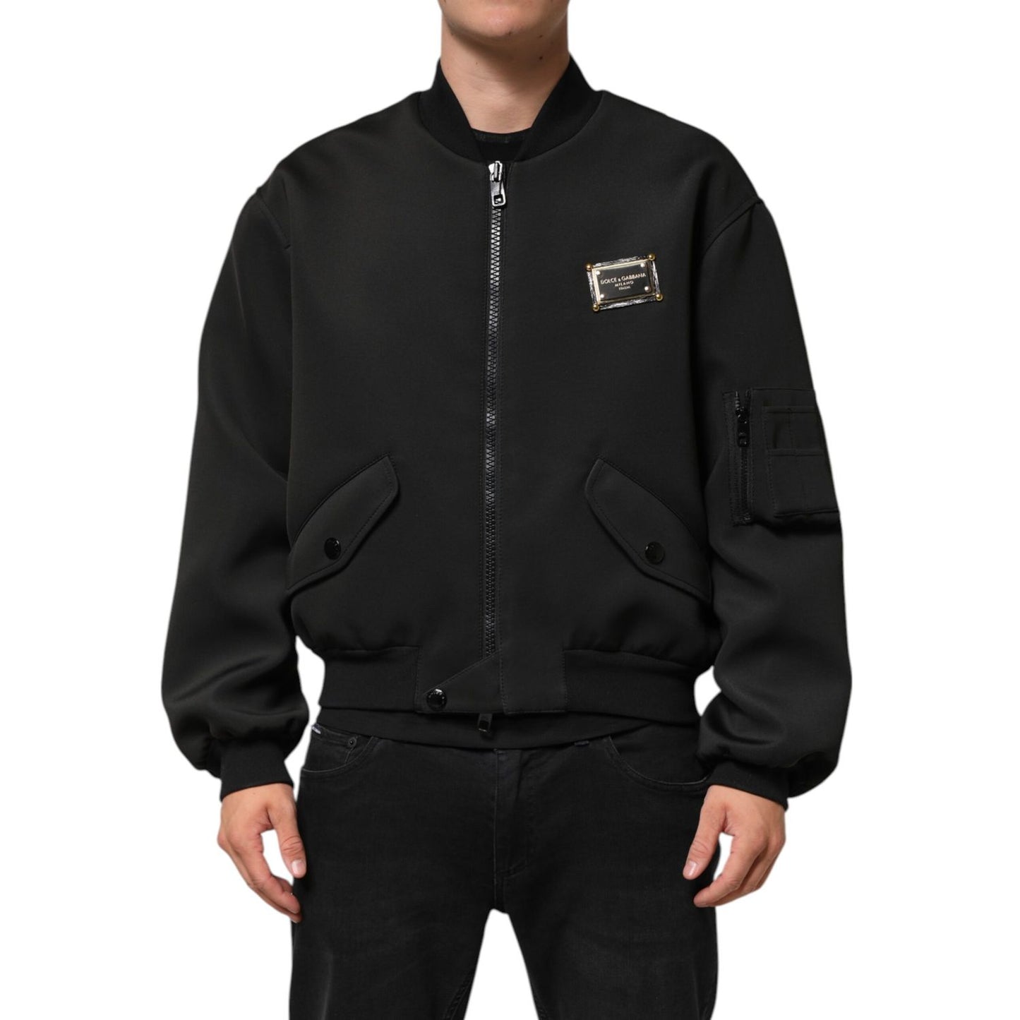 Dolce & Gabbana Black Polyester Logo Plaque Bomber Jacket with metal logo plaque and zip closure, front and sleeve pockets.