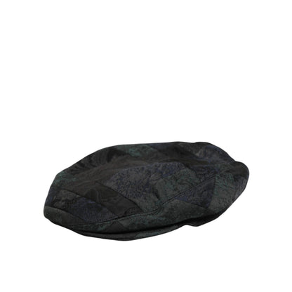 Dolce & Gabbana Black Polyester Newsboy Men Cloth Capello Hat in classic black with eight-panel design, perfect for vintage-inspired style.