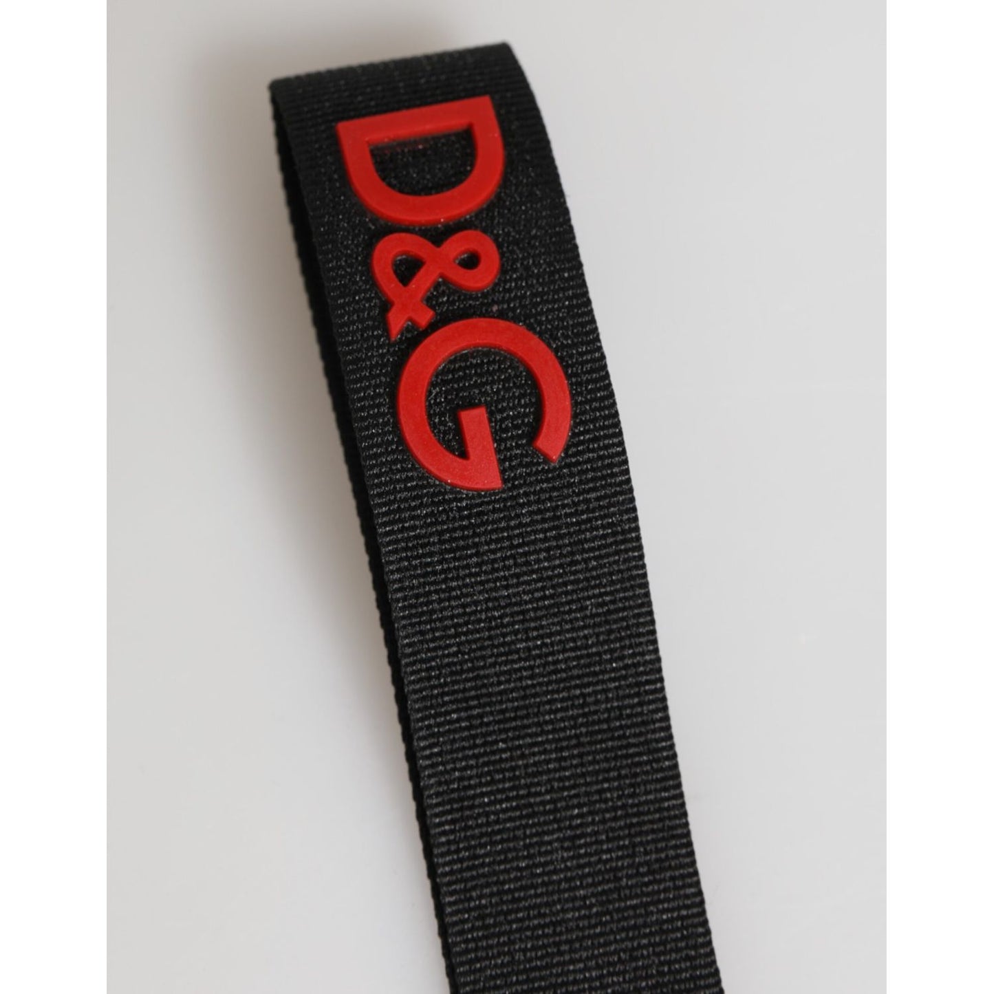Dolce & Gabbana Black Red Logo Polyester Brass Holder Keychain Keyring with stylish red logo on black fabric.