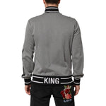 Rear view of Dolce & Gabbana Black White Houndstooth Wool Crest Jacket Sweater with KING text on waistband.