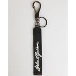 Dolce & Gabbana Black White Polyester DG Logo Silver Men Keychain Keyring with sleek design and logo details.