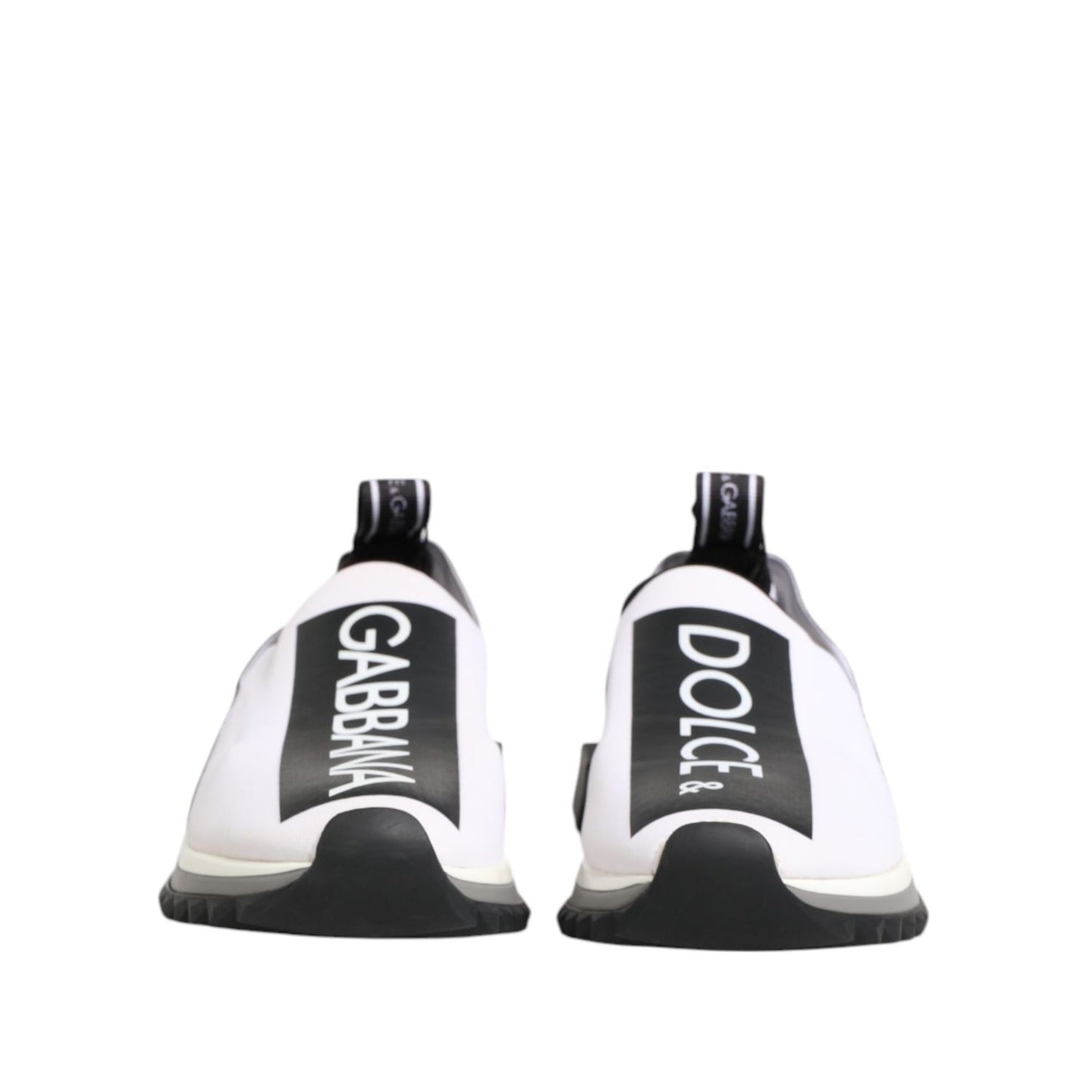 Back view of Dolce & Gabbana Black White Slip On Sorrento Sneakers Shoes displaying logo detail and rubber sole.