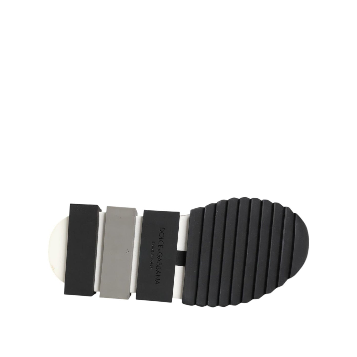 Sole view of Dolce & Gabbana Black White Slip On Sorrento Sneakers Shoes showing logo detail and tread design.
