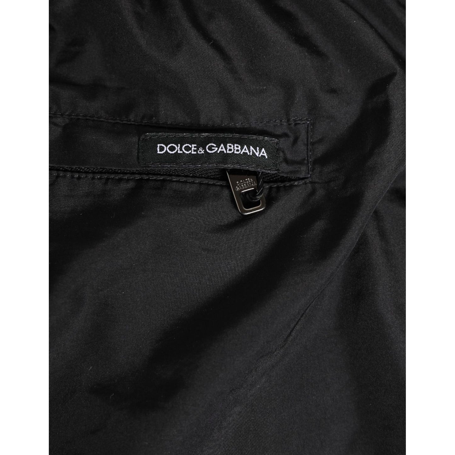 Dolce & Gabbana Black White Striped DG Logo Men Short Swimwear with close-up of logo detail on pocket