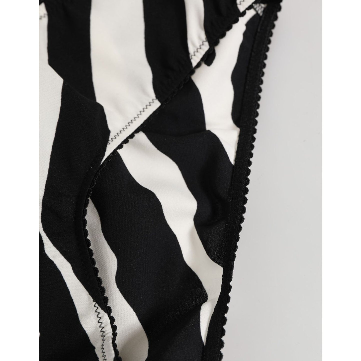 Close-up of Dolce & Gabbana Black White Zebra Print Slip Briefs Underwear showcasing elegant zebra pattern and detailed stitching.