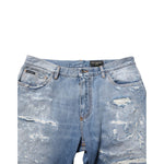 Dolce & Gabbana Blue Distressed Ripped Denim Trouser Jeans with heavy distressing and ripped details, featuring the brand logo plaque.