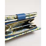 Interior view of Dolce & Gabbana Blue Leather Continental Tile Print Zip Card Holder Purse Wallet with vivid Majolica print.
