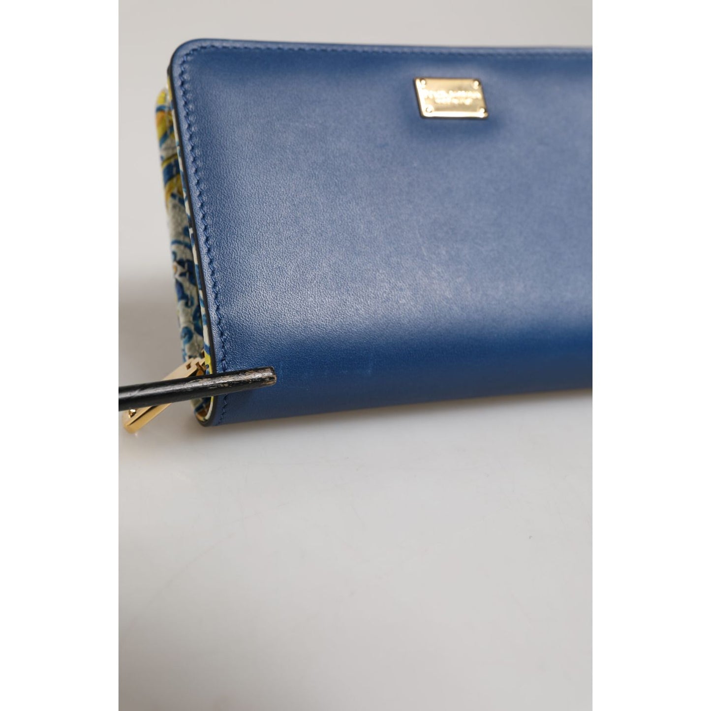 Dolce & Gabbana Blue Leather Continental Tile Print Zip Card Holder Purse Wallet with gold metal details.