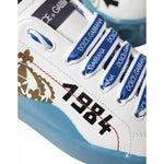Dolce & Gabbana Blue White Printed Portofino Melt Sneakers in calfskin leather with logo details and rubber sole, close-up view.