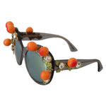 Dolce & Gabbana DG4283B Acetate Crystals Orange Appliques Sunglasses with gray lenses and unique orange crystal decor.