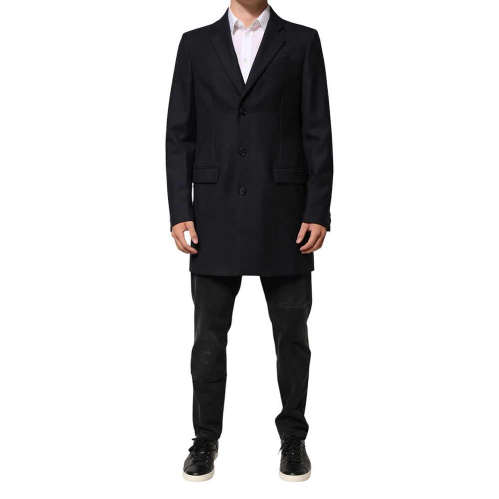 Dolce & Gabbana Dark Blue Wool Men Jacket Coat Blazer Suit with three-button closure and notch lapel, modeled with black pants.
