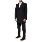 Dolce & Gabbana Dark Blue Wool Men Jacket Coat Blazer Suit with notch lapel and button closure, worn by a model.