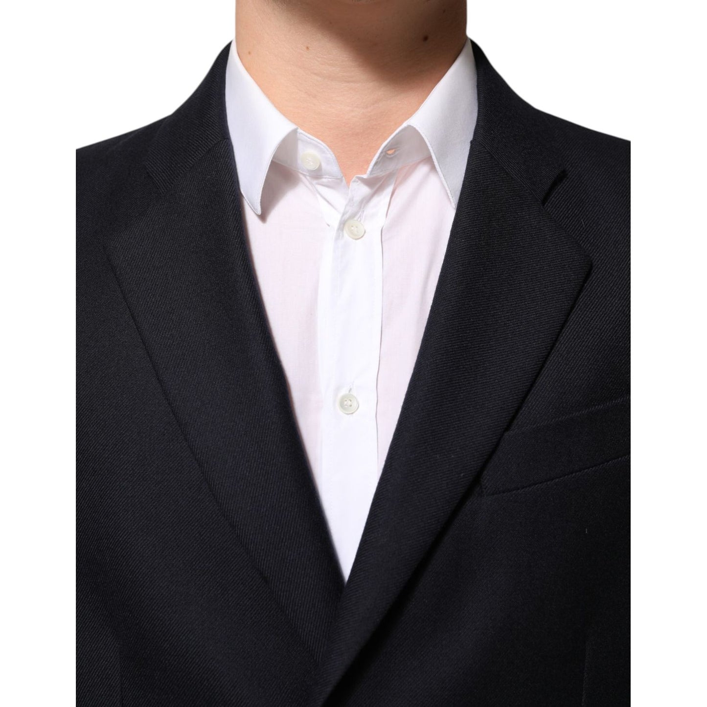Dolce & Gabbana Dark Blue Wool Men Jacket Coat Blazer Suit with white shirt, close-up of notch lapel and button closure.