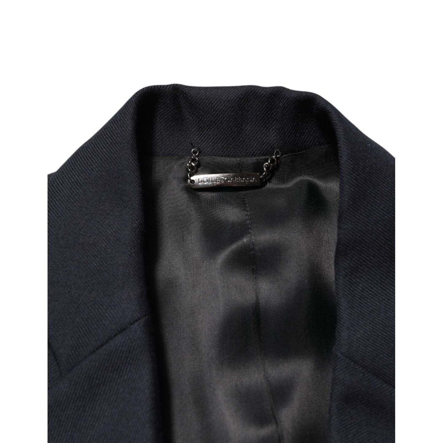Interior view of Dolce & Gabbana Dark Blue Wool Men Jacket Coat Blazer Suit with satin lining and logo detail.