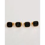 Dolce & Gabbana Gold Tone Brass JAZZ Letter Set 4 Pieces Adjustable Ring, luxury statement rings for music lovers.