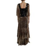 Back view of Dolce & Gabbana Leopard Print Silk Sequin Ruffle Maxi Dress with flowing tiers and sequined bodice.