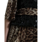 Dolce & Gabbana Leopard Print Silk Sequin Ruffle Maxi Dress with black sequined bodice and wide sleeves.