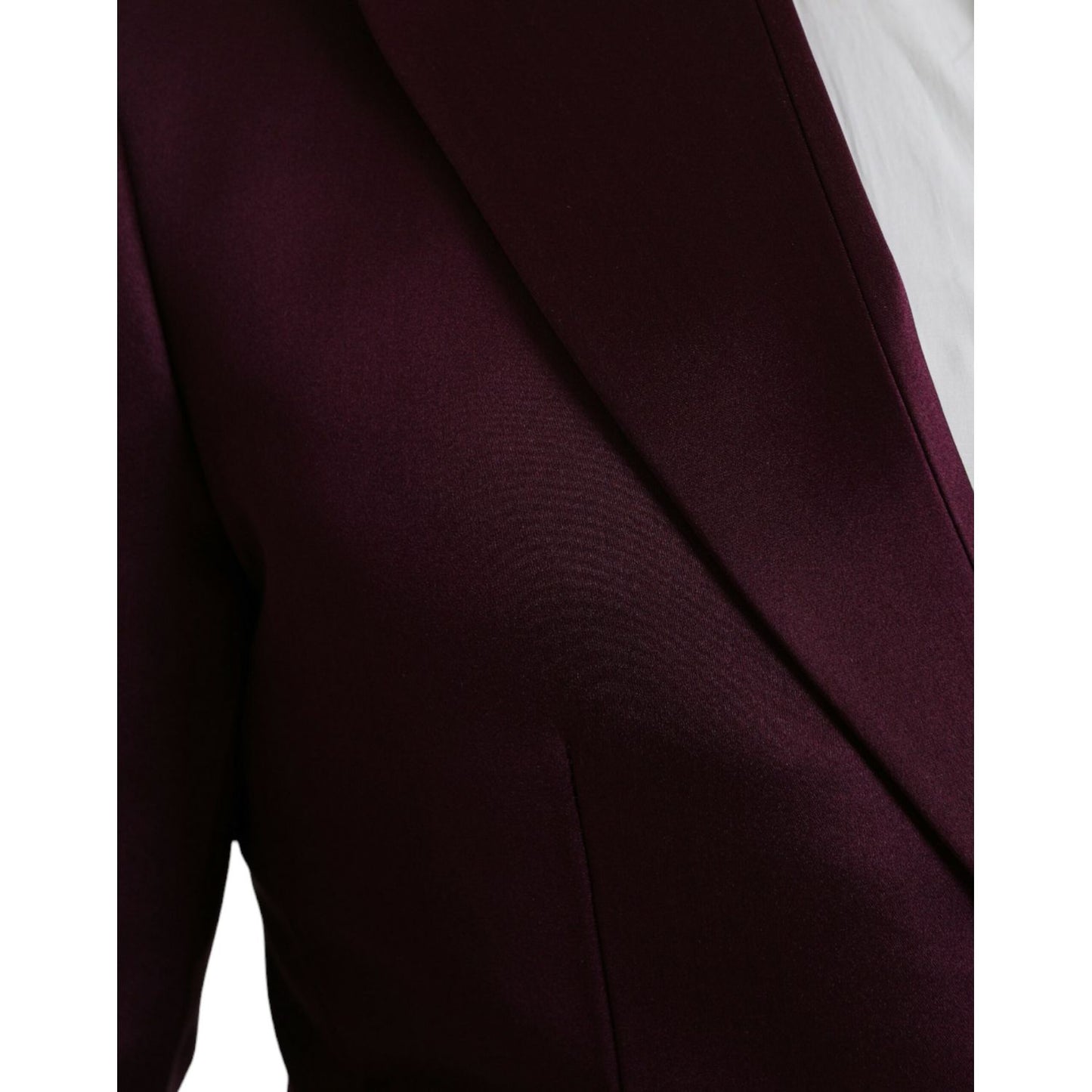 Detail view of Dolce & Gabbana Maroon Silk Single Breasted Coat Blazer, showcasing luxurious silk fabric and maroon color.