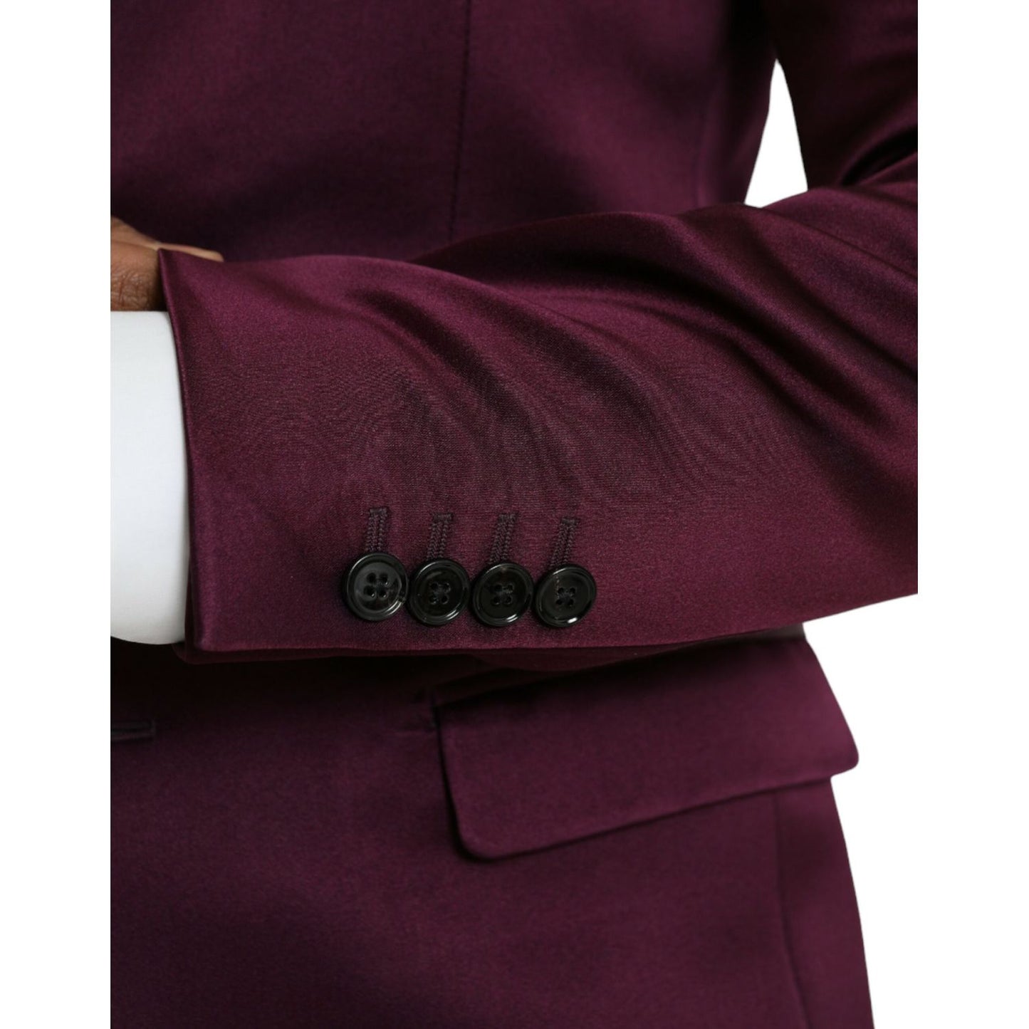 Close-up of sleeve detailing on Dolce & Gabbana Maroon Silk Single Breasted Coat Blazer, featuring black buttons and premium craftsmanship.